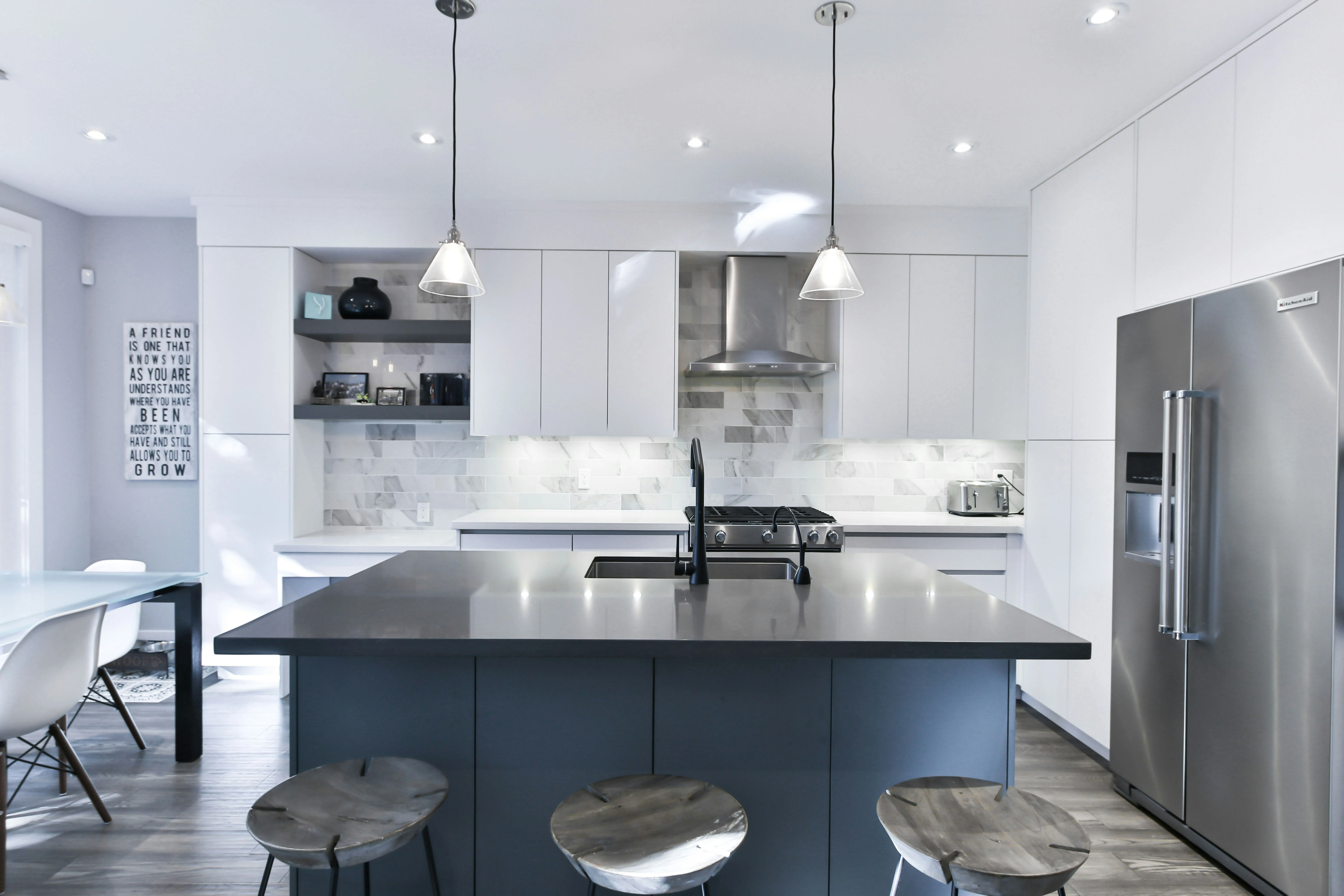 Basement transformation in Mississauga featuring new drywall, flooring, and recessed lighting